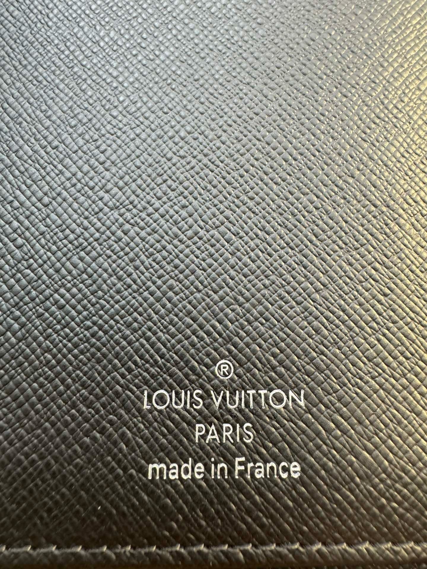 L0vis Vvtt0n M62295 Zippy Wallet Vertical
